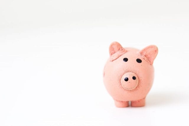 Piggy bank illustrating the factors that influence the cost of app development